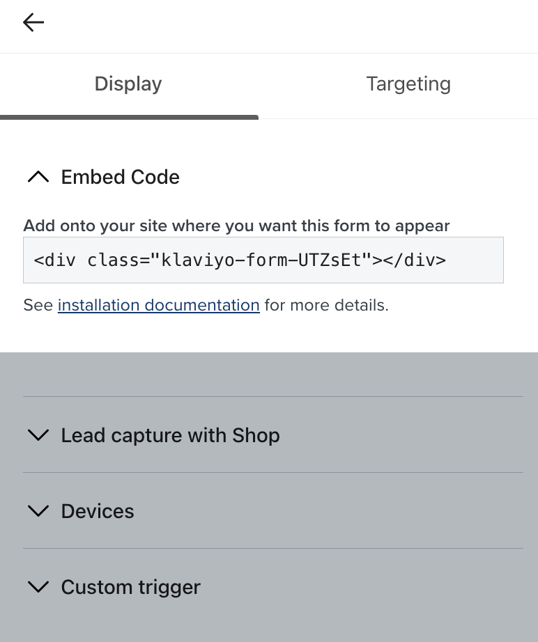 An example form's embed code being copied from within the display menu in the form editor.